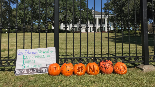 Activists set up their pumpkins outside Gov. John Bel Edwards’ home.